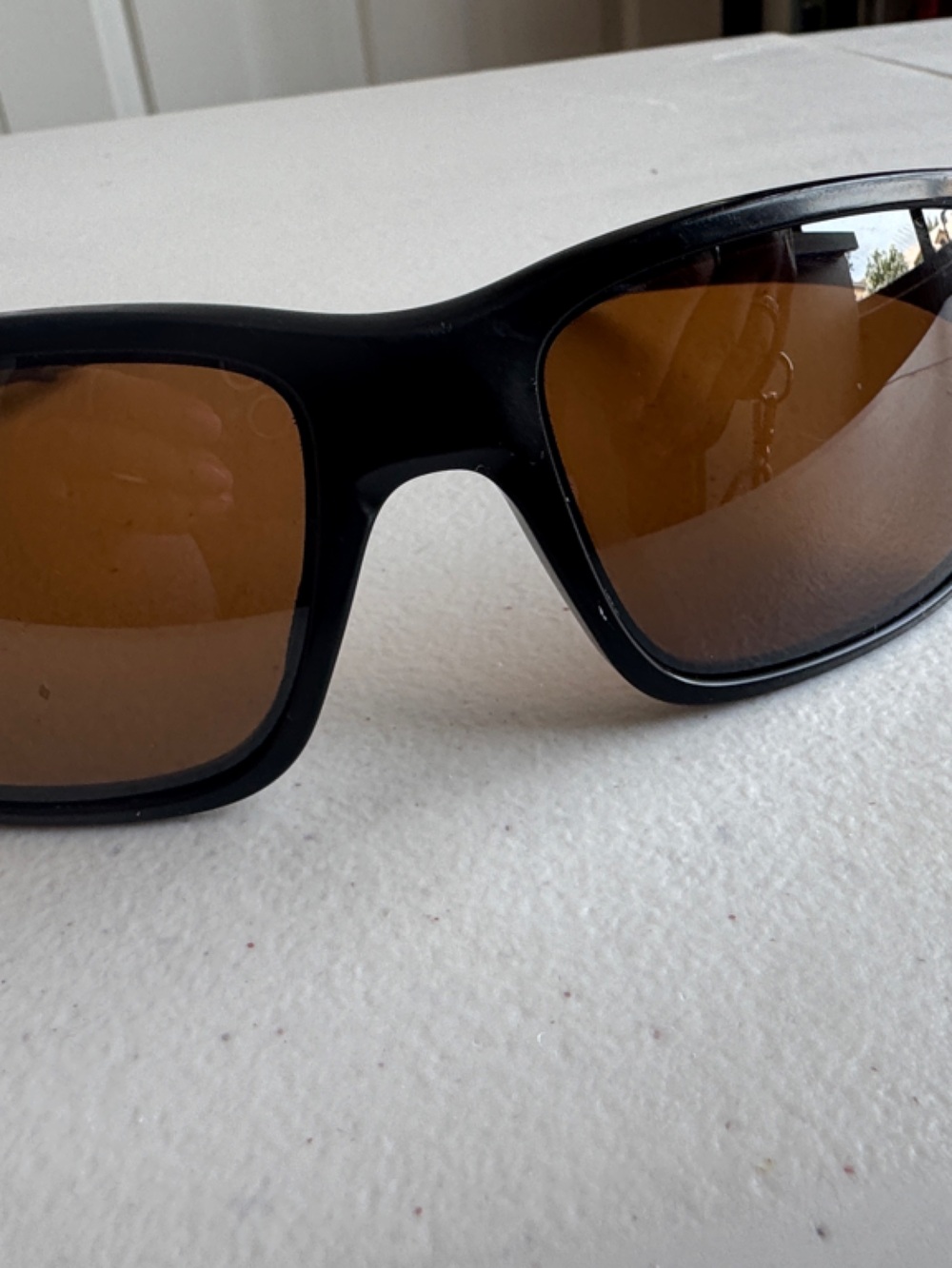 Oakley Black Frame Sunglasses with Brown Lenses